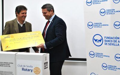 Acto de entrega del donativo al Banco de Alimentos de Sevilla